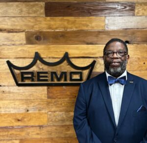 Christopher Hart with Remo logo