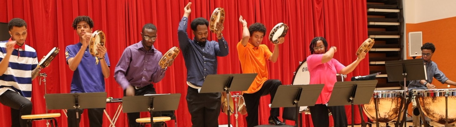 Alliance of Black Orchestral Percussionists proteges with tambourines